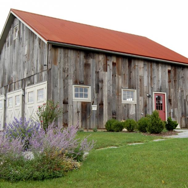 Pioneer Millworks reclaimed and sustainable wood exterior siding products featuring American Prairie Weathered Grey