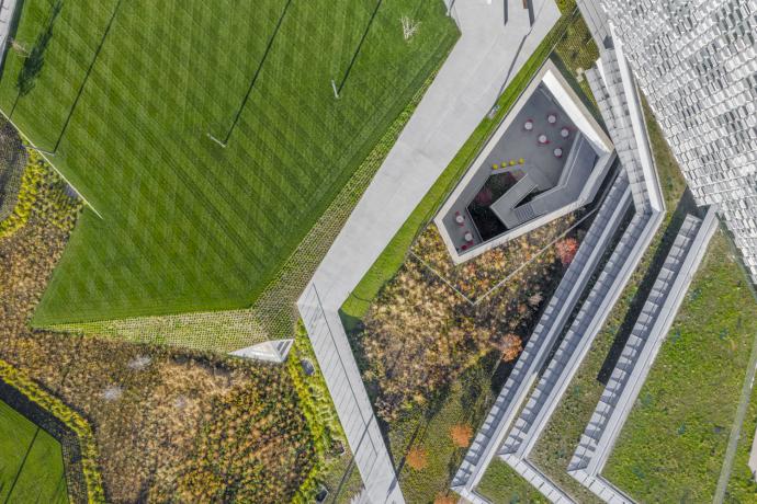 (Harvard Science and Engineering Complex in Allston, MA. The wood flooring & benches in the interior were provided by Pioneer Millworks. Photography by Brad Feinknopf Courtesy of Behnisch Architekten.)