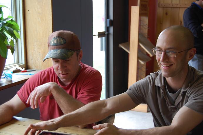 A somewhat younger version of Alex (right) on lunch break with long-time co-worker, Cal (left).