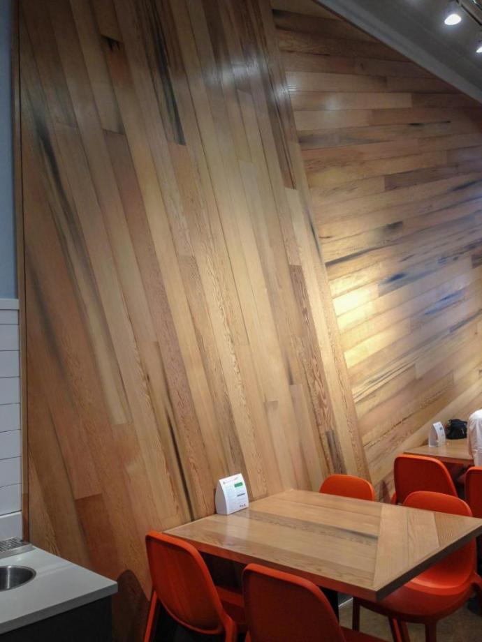 Next Level Burger in Oregon features wall paneling and tabletops crafted with the reclaimed Douglas fir Vat Staves.