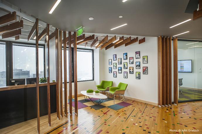 Pioneer Millworks Original Gym Flooring in a confetti pattern. Pioneer Millworks Black & Tan Mixed Oak in Ashley McGraw’s cafe. Photo by John Griebsch