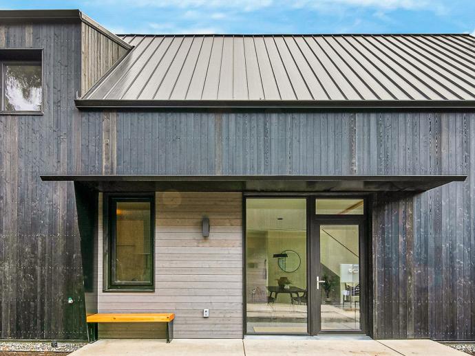 Pioneer Millworks Larch Siding in Black and Pebble finish. ⁠