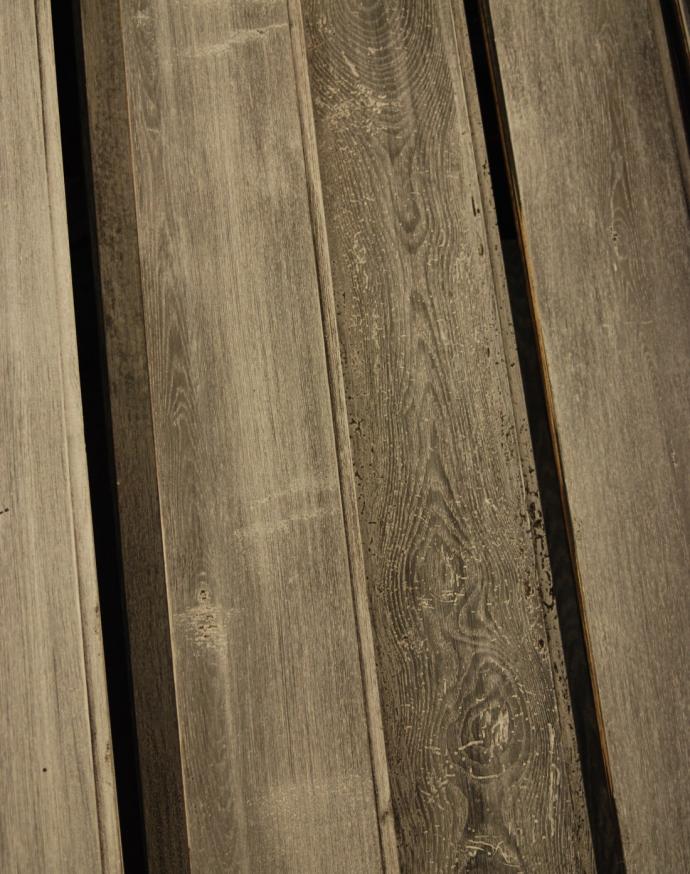 The grey boards have a white topcoat that highlights the reclaimed details- grain, nailholes and insect marks.