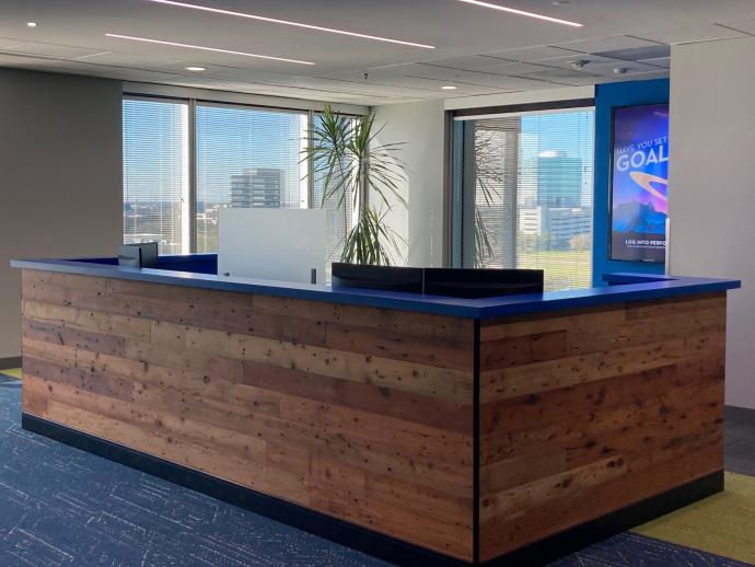 Empyrean office in Minneapolis, MN featuring Pioneer Millworks Saw-kissed Douglas fir wall paneling. Photo by RJ Kosadnar. 