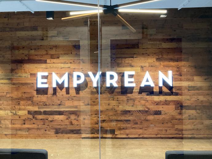 Empyrean office in Minneapolis, MN featuring Pioneer Millworks Saw-kissed Douglas fir wall paneling. Photo by RJ Kosadnar. 