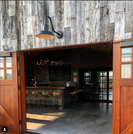 Reclaimed barn siding, Pioneer Millworks American Prairie Taphouse. Photo from Oak & Apple’s Instagram.