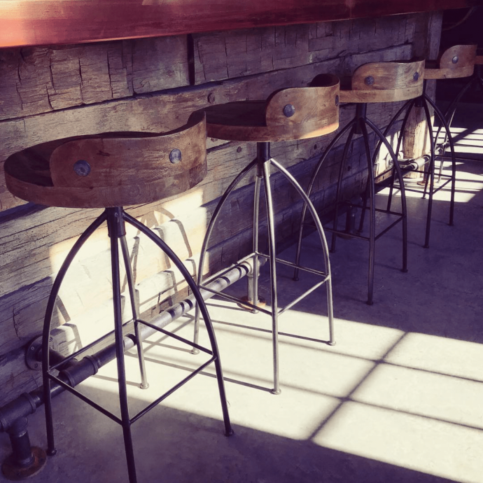 Pioneer Millworks reclaimed timber skins on the bar front. Photo from Oak & Apple’s Instagram.