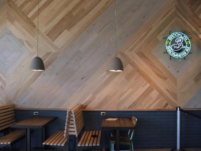 Shake Shack in Michigan showcases the cleaner look of reclaimed wood (our Black and Tan–Tan Mixed Oak with Raked(TM) texture) and Modern Farmhouse Clean Hickory.