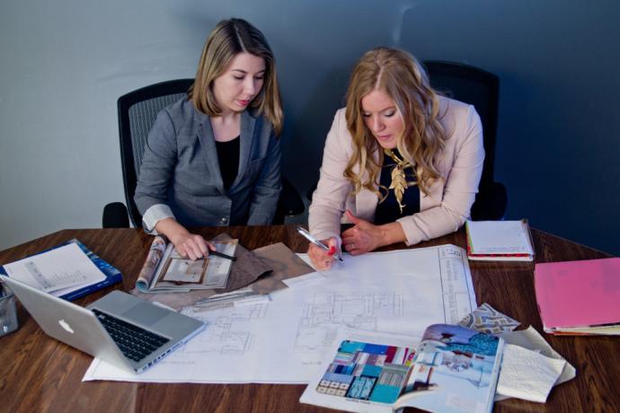 Tiffany Hanken (right) collaborates with Sara Mericle at the Tiffany Hanken Design office in MN.