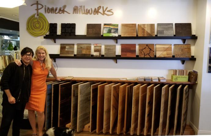 Interior Designer, Christian, and Hospitality! Principal, Annika, pictured with the Pioneer Millworks display in the Hospitality! showroom.