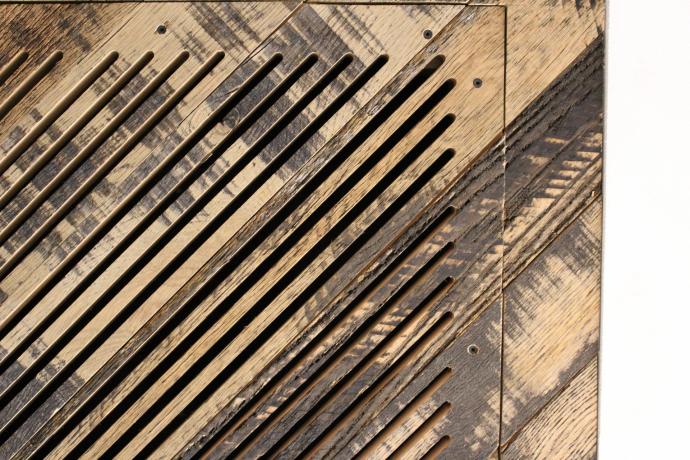 AMA crafted a vent by carving into Black & Tan planks. (This reminds us a bit of our ‘raked’ reclaimed wood – more on that in another post.)