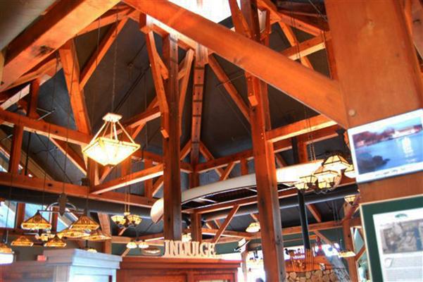 Interior of Steamboat Landing’s Cove Restaurant’s reclaimed timber frame by New Energy Works.