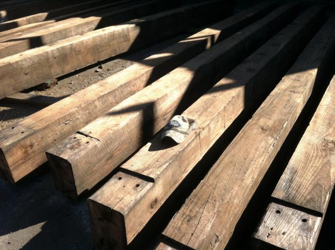 Pine timbers that were salvaged out of a Kentucky tobacco warehouse.
