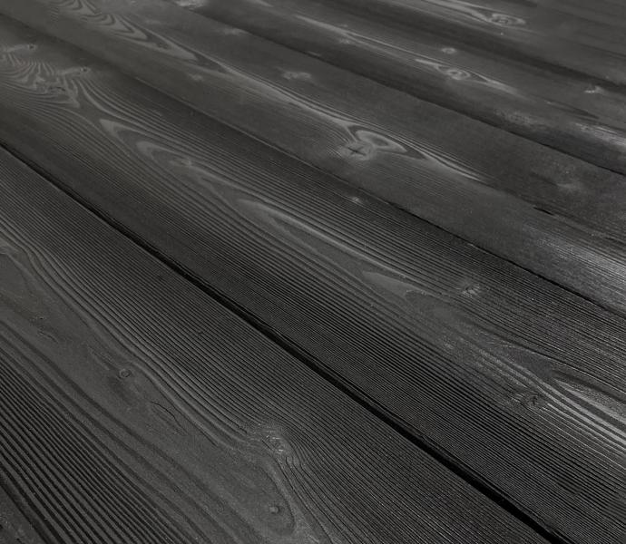 Shou Sugi Ban Larch Carbon | 1 by Pioneer Millworks. Charred wood siding and paneling that is burned, brushed once, and coated with non-toxic, water-based polyurethane