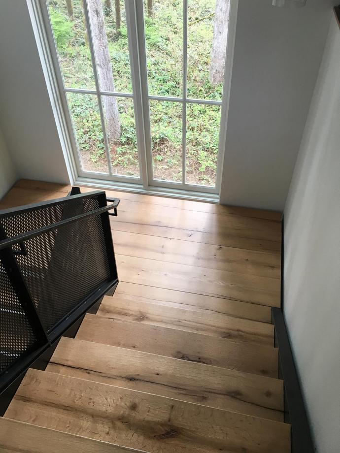 Pioneer Millworks reclaimed White Oak American Gothic flooring as stair treads