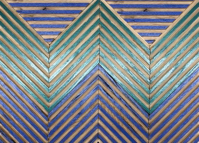 Combining our Raked texture with opaque color tones on reclaimed oak brings new dimension, movement, and vibrancy to the chevron pattern.