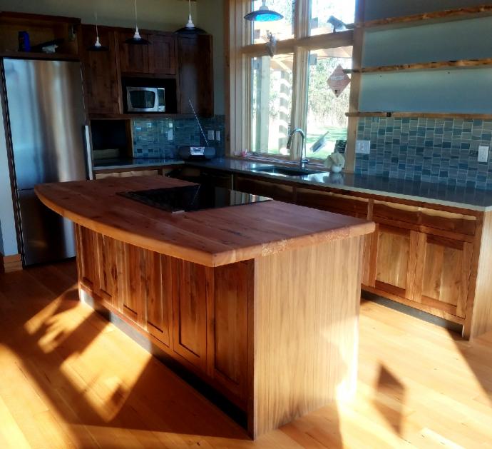 Walnut cabinetry utilized a mixture of Reclaimed Walnut and board stock from a walnut tree which was removed from the build site.