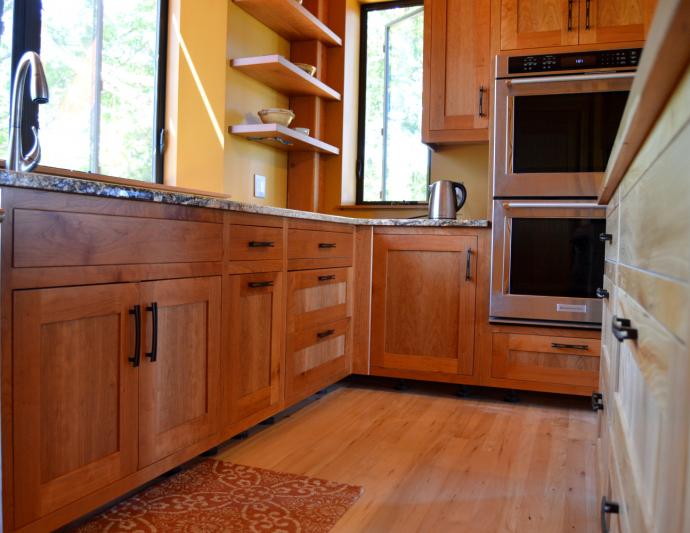 Tom and Ann’s kitchen was crafted of the same rescued Cherry (solid) by our sister company NEWwoodworks.