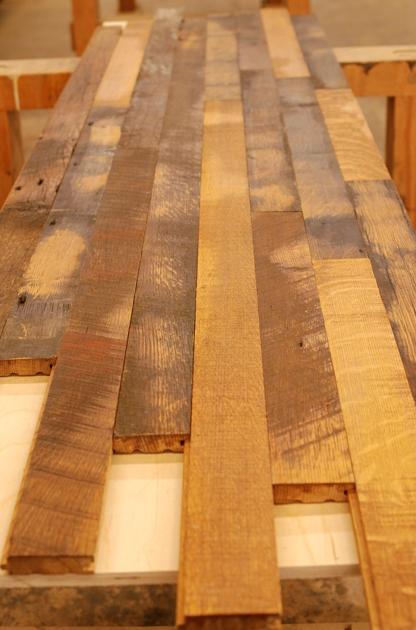 This floor is pretty much the reclaimed wood trifecta: a unique and desirable source and story, amazing character and quarter sawn boards, and a prefinish to allow for a fast install process.