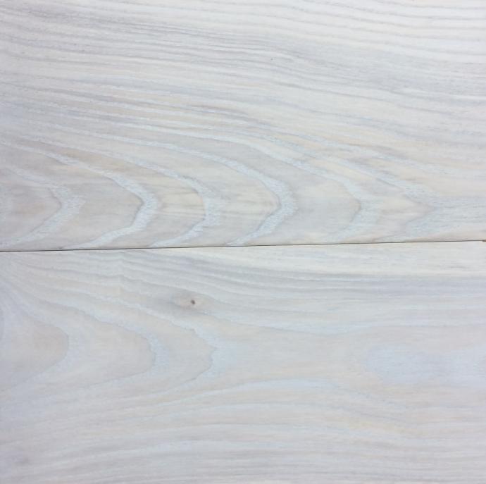 Sustainably Harvested Ash with a custom white finish.