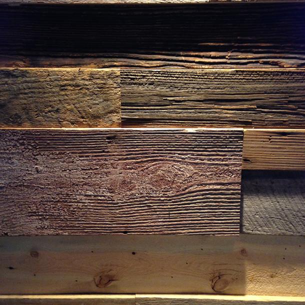 Close up of the various grades of reclaimed wood paneling in multiple thicknesses that were used to achieve this look at the Brew Brothers restaurant in Columbus, OH