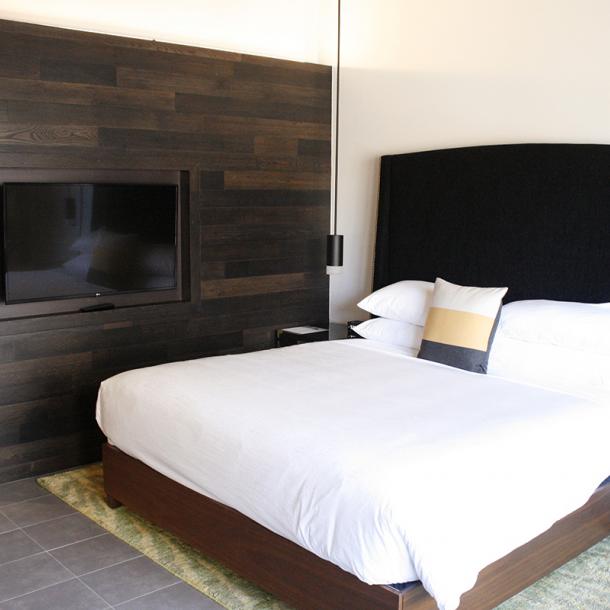 American Gothic Mixed Oak reclaimed wood wall paneling in the guest rooms of Hi-Lo Hotel in Portland, OR. 