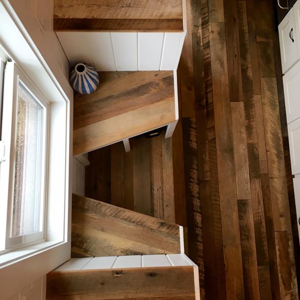Pioneer Millworks Settlers Plank Mixed Hardwoods reclaimed wood flooring in a tiny home in Portland, OR