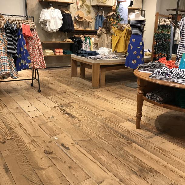 Pioneer Millwork reclaimed softwoods custom mix floor in Anthropologie, Natick, MA.
