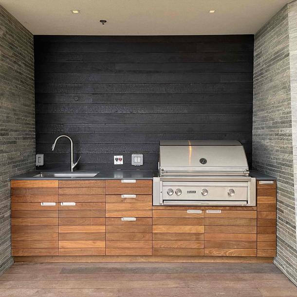 Pioneer Millworks Shou Sugi Ban FSC-Certified® Douglas fir Deep Char used as paneling for an outdoor cooking area in California.
