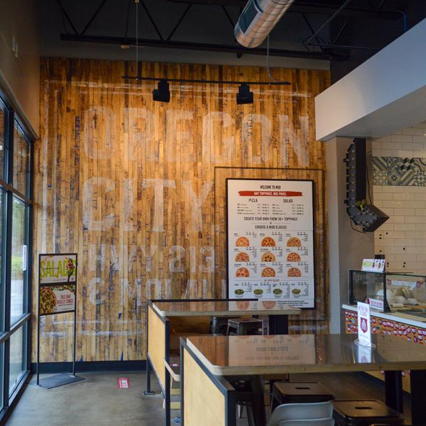 Pioneer Millworks reclaimed Foundry Maple Painted & Sanded in blue featured on this accent wall for MOD Pizza in Oregon City, OR.
