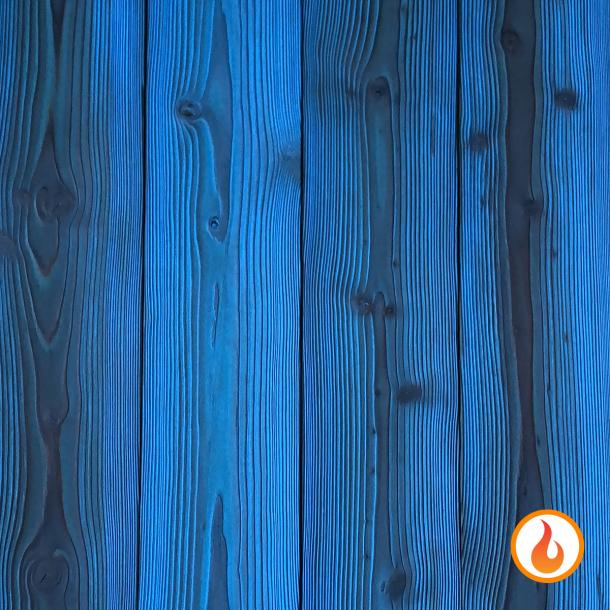 Shou Sugi Ban Larch Cobalt by Pioneer Millworks. Charred wood siding and paneling that is burned, brushed twice, and coated with an exterior oil 