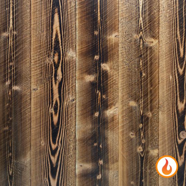 Shou Sugi Ban Larch Shallow Char by Pioneer Millworks. Charred wood siding and paneling that is burned with a circle sawn texture