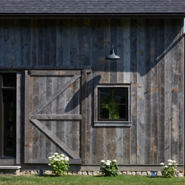 Pioneer Millworks Farmed Board Siding featured on a private barn in Upstate New York. Photos by Tim Wilkes
