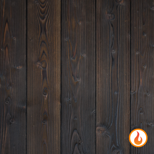 Shou Sugi Ban Larch Scorched by Pioneer Millworks. Charred wood siding and paneling that is burned, brushed twice, and coated with an exterior oil 