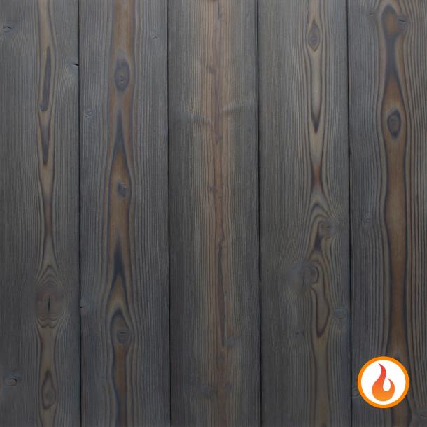 Shou Sugi Ban Larch Charcoal by Pioneer Millworks. Charred wood siding and paneling that is burned, brushed twice, and coated with an exterior oil 