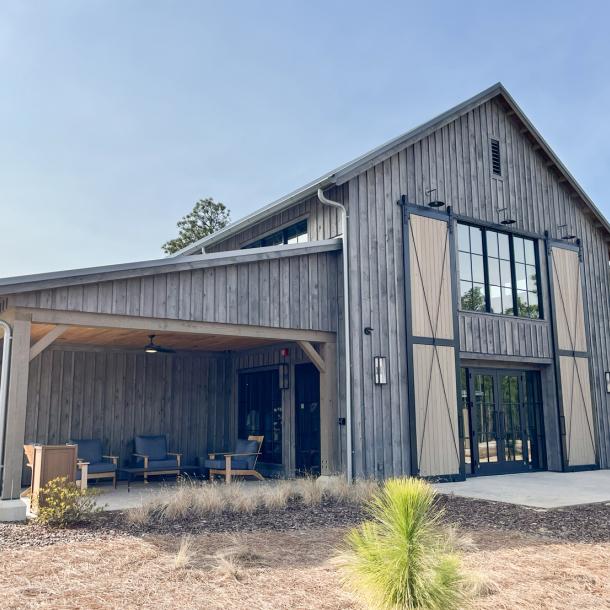 Pioneer Millworks Farmed Board Siding, Mushroom Board Exterior Ceiling, Modern Farmhouse White Oak Flooring in 5% White at Pinehurst #10 Proshop