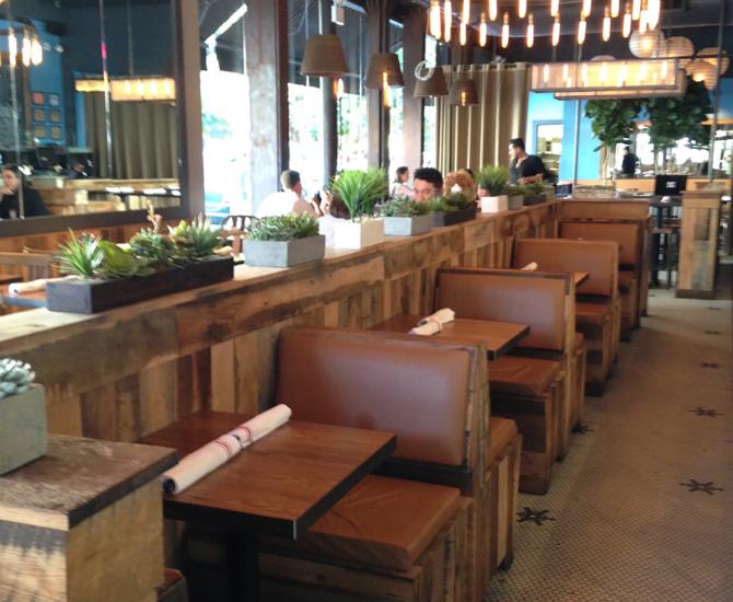 The booths in Mexicue were fabricated from our Settlers' plank reclaimed wood. 