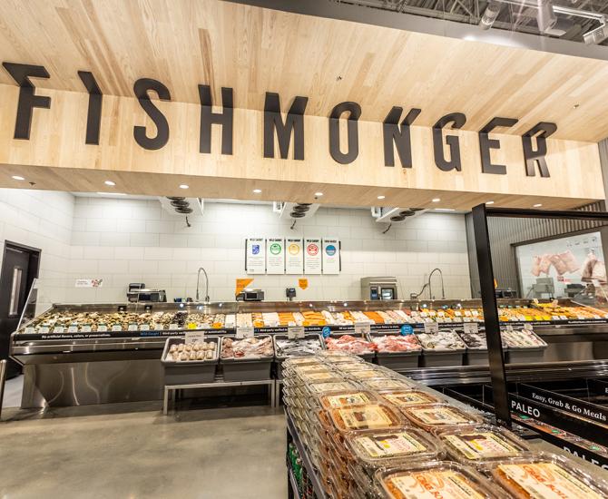 Pioneer Millworks Whole Modern Farmhouse Clean Ash paneling with poly and fire retardant in Whole Foods, Atlanta, GA