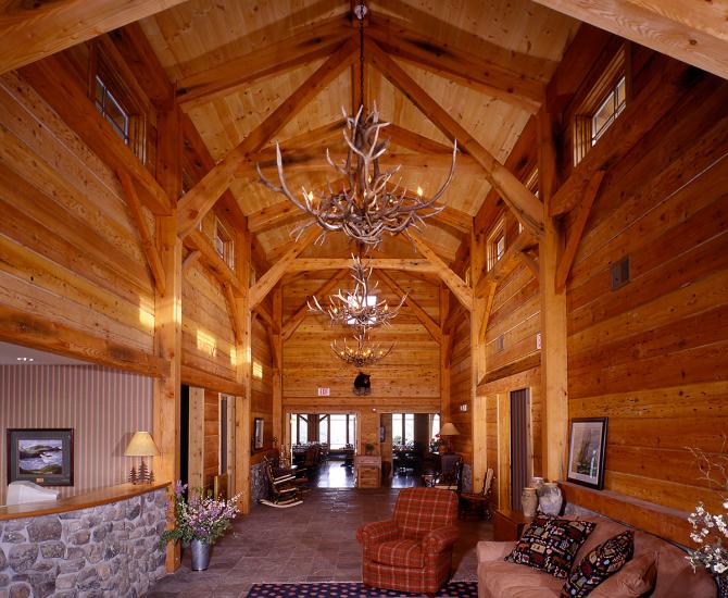 The reception area at Bristol Harbor Resort off Canandaigua Lake welcomes visitors in an industrial salvaged timber frame.