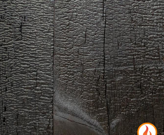 Shou Sugi Ban Larch Deep Char by Pioneer Millworks. Black wood siding and paneling that is burned, and coated with a non-toxic, water-based polyurethane