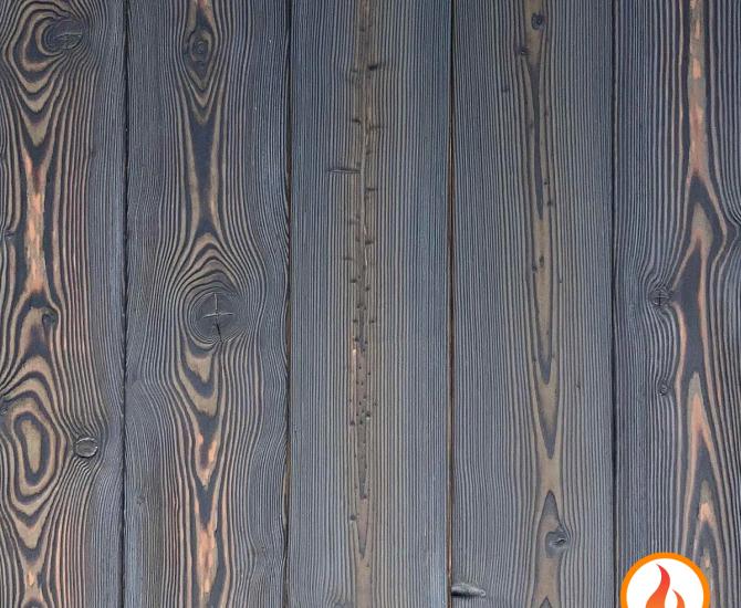 Shou Sugi Ban Larch Cinder by Pioneer Millworks. Charred wood siding and paneling that is burned, brushed twice, and coated with an exterior oil 