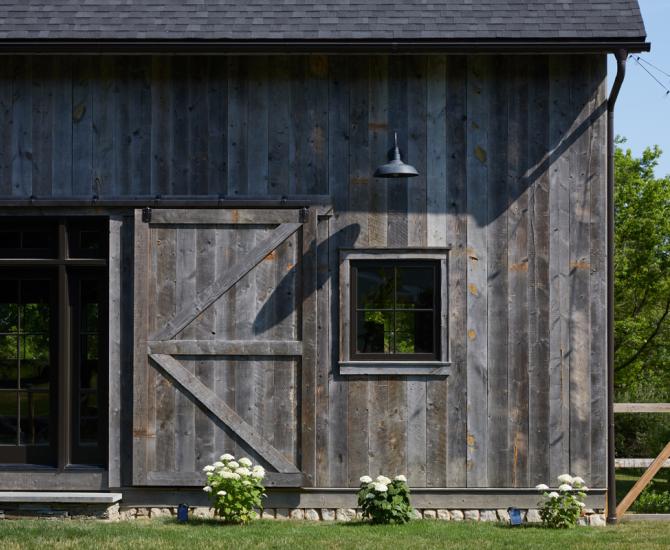 Pioneer Millworks Farmed Board Siding featured on a private barn in Upstate New York. Photos by Tim Wilkes
