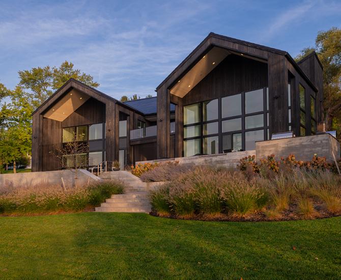 Private Residence in the Finger Lakes Region of New York featuring Pioneer Millworks Accoya Siding in Black and Sand