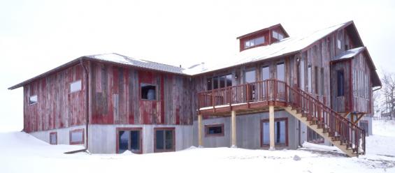 Pioneer Millworks reclaimed wood--American Prairie--Original Painted--Red--Reclaimed barn siding used on an exterior home