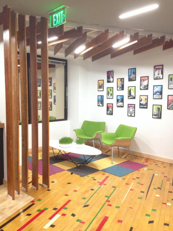 Pioneer Millworks reclaimed wood--Original Gym Flooring--Reclaimed Wood Flooring in a "confetti" pattern in a private office