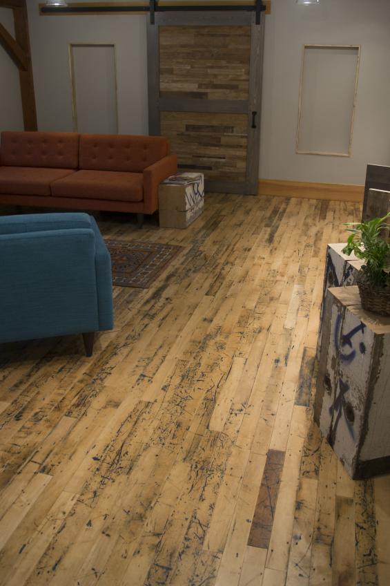 Pioneer Millworks reclaimed wood--Foundry Maple--Painted and Sanded--Reclaimed Flooring in an office with custom blue finish