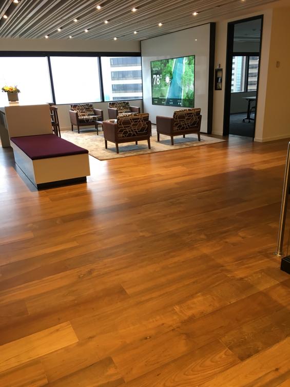 Reclaimed Teak wood flooring in an office lobby in Seattle, WA