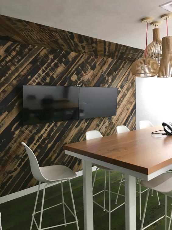 Reclaimed Oak Black and Tan 50/50 wall paneling in meeting room