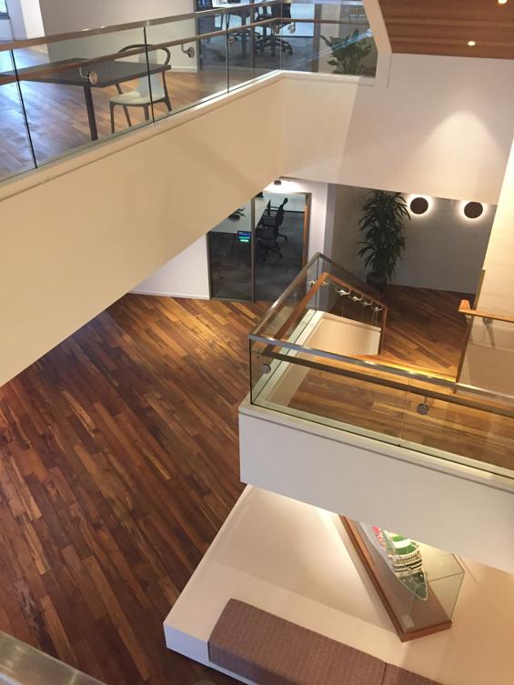 Over 14,000 square feet of the salvaged Teak, with an all natural oil/wax finish, found new life throughout all six levels of Holland America’s new building. The wood unifies each level, offering incredible durability and warm tones to the various work areas.