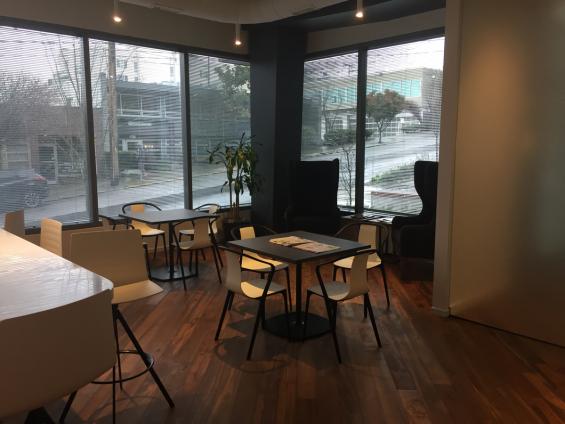 Reclaimed Teak Bright wood flooring in the office common area.